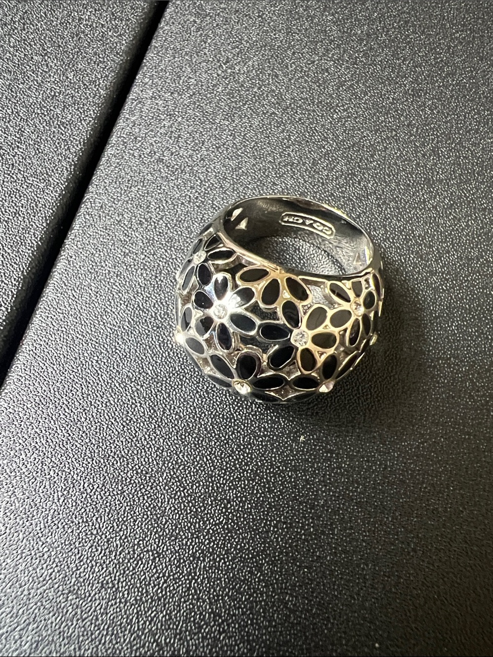 Coach Silver Floral Cutout Dome Ring with Black Accents